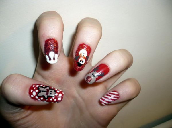 3. "Sparkly and Glittery Christmas Nail Art for a Cool and Festive Vibe" - wide 5