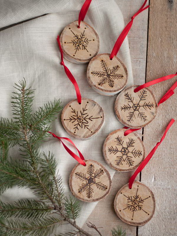 These little wood burned snowflake ornaments will instantly give your 