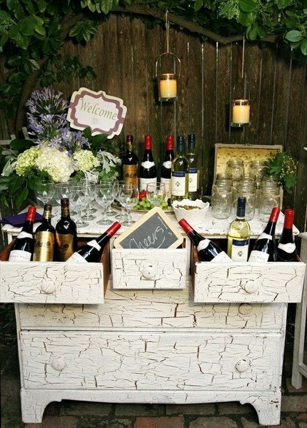 Wine Themed Drink Station. This wine themed drink station is perfect for your wedding celebration with bottles, a cheers sign and the well displayed glassware. This creative beverage station will enable you to incorporate your personalities and passions into your reception decor. 