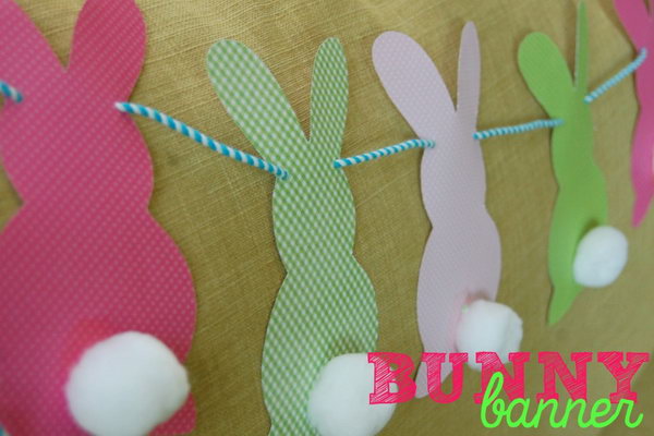 Bunnies on Construction Paper. Glue the pom poms on the colorful bunnies on construction paper and thread them all with a string. You can hang them anywhere as you like, Your kid must like this adorable decoration very much. 