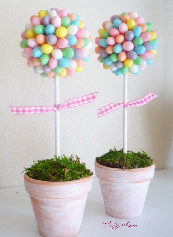 Jelly Bean Topiary. This cute and romance themed jelly bean topiary adds a fresh spring flavor for your Easter decoration. Glue each jelly bean onto a pink Styrofoam ball add floral foam to anchor the dowel into and cover it with moss. 