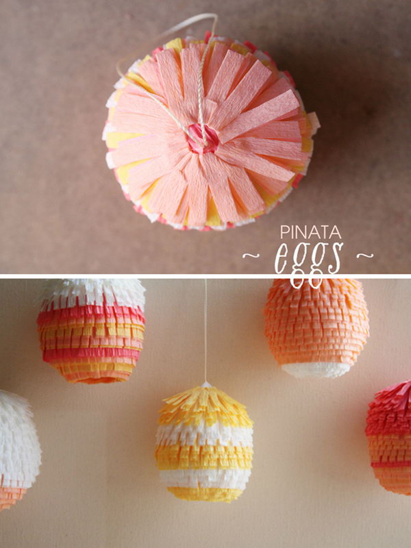 Cute Easter Pinata Eggs. DIY these pi?ata Easter eggs with blown out jumbo chicken eggs, floral crepe paper, thread, glues and toothpicks. They are easy to make and will definitely brighten up your celebration. 