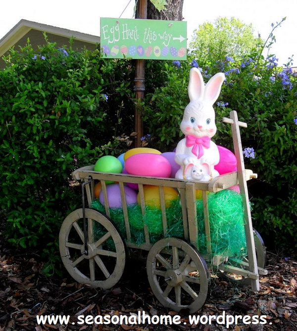 Easter Yard Decoration. Display a cart with colorful Ester eggs and put a cute Easter bunny at the top. You can also hang the guide board to direct the way for egg hunting. 