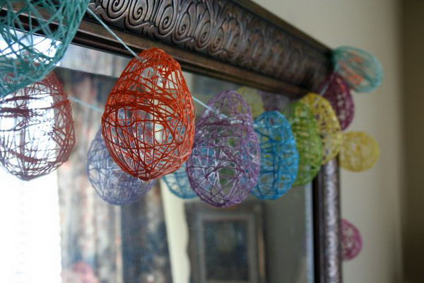 Easter Egg Garland. Make these colorful Easter eggs with strings wrapping around the water balloon. When the shape is almost done, you can pop it. Glue these eggs on the string, you can hang it around the door, the window as you like. 
