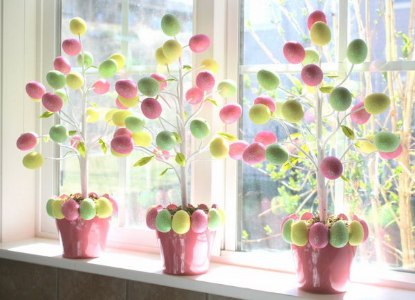 Target Dollar Egg Tree. To DIY this beautiful Easter egg tree, all you need is the Easter tree a pot and 2 boxes of foam glitter Easter eggs. These eggs are light weight, you can pock them onto the branch even without gluing. 