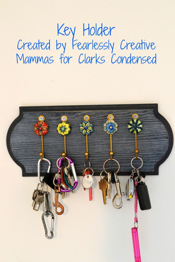 DIY Key Holder with Vintage Look. Using unusual hooks and mixed paints to change the traditional look of the key holder. I love the colors of these hooks and they are so unusual and they add more chic and vintage look to your home. See more instructions 