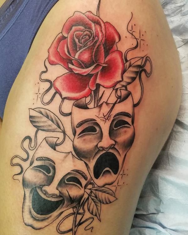 Smile Now Cry Later with red rose thigh tattoo