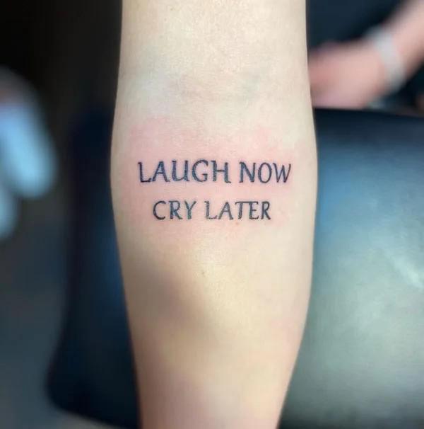 smile now cry later lettering tattoo