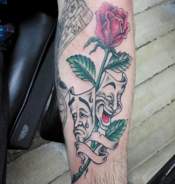 smile now cry later with a stem of rose tattoo