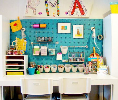 Pegboard Wall of Basement Playroom. Cover the Wall with painted pegboard Panels. With the help of hanging hardware designed for pegboards, you can decorate the wall with photos as well as baskets for DVDs and magazines.