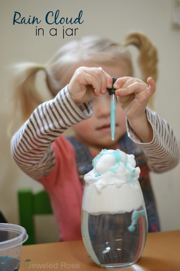 Rain Clouds in a Jar Science Project. Fill the jars or containers with water and then top with shaving cream. Fill their pipettes or droppers with blue water and squeeze it onto their cloud. As the cloud fills with water it will begin to rain.