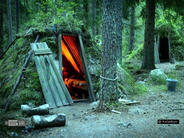 Sweden's Kolarbyn Hotel. It is one of Sweden's most primitive hotel on the shore of Lake Skarsjon. No electricity, meals cooked over a fire, floating sauna on the lake.