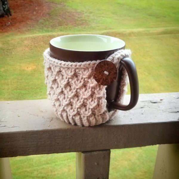 DIY crochet coffee cozy which keep coffee in cups warm while protecting fingers from the heat.