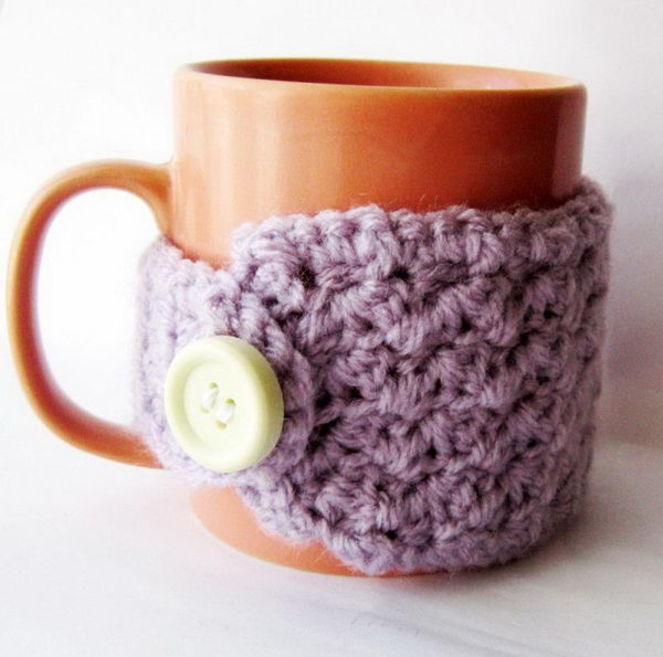 DIY crochet coffee cozy which keep coffee in cups warm while protecting fingers from the heat.