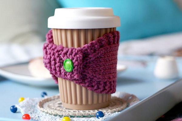 DIY crochet coffee cozy which keep coffee in cups warm while protecting fingers from the heat.