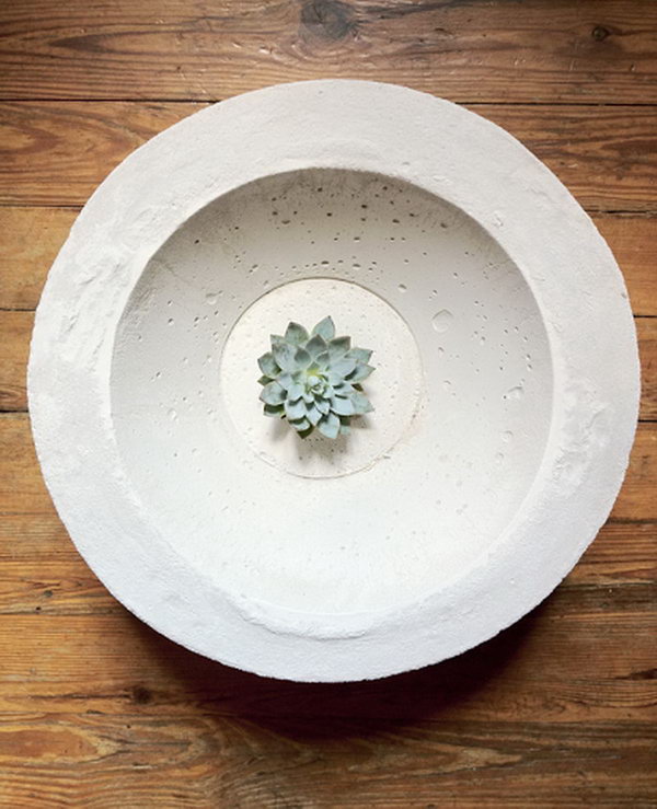 DIY Concrete Bowl Centerpiece. Concrete isn’t just for the infrastructure and base of certain buildings. You can use concrete in a variety of DIY projects, and infuse it into everyday products.