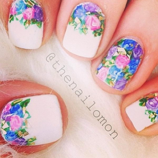 Pretty Flower Nail Art. These flower designs are so cute and make a regular manicure look like a piece of artwork.