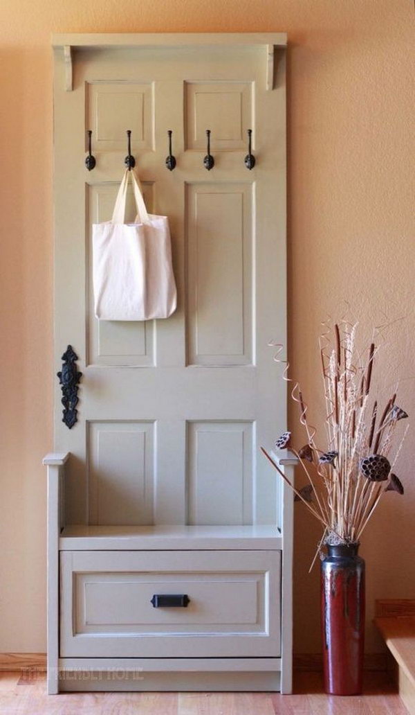 Repurposed vintage bench from door. Allow you to store books, shoes and other items in the bench, and sit on it while having the supply's in the compartments.