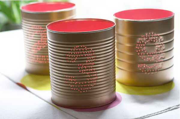 Tin can table numbers. Tin cans are not just for stacking up in your cabinet, tossing in the trash or sending to the recycle bin. Combine those with a rope, paints, craft papers and a generous helping of crazy imagination, and you will have a cool creation on your hands.