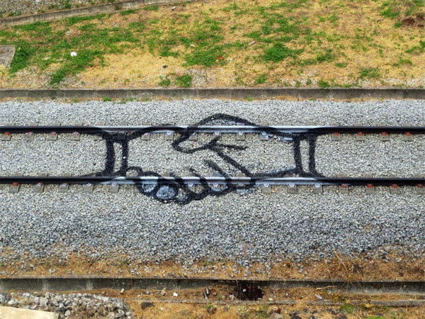 Street Art On The Railroad Tracks by Artur Bordalo