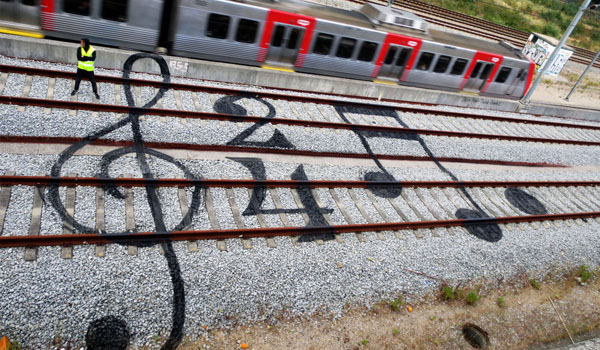 Street Art On The Railroad Tracks by Artur Bordalo