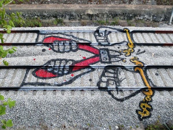 Street Art On The Railroad Tracks by Artur Bordalo