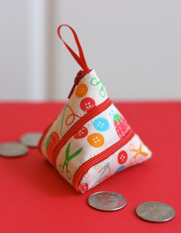 A self-zipping coin purse made from a ribbon, 