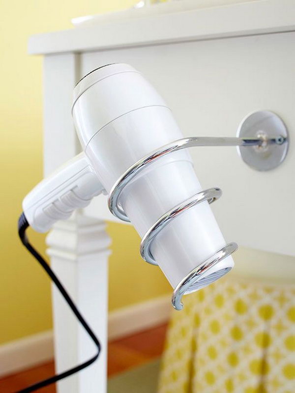 Blow Dryer Holster. Install a spiral holder for your blow dryer on the side of the vanity. Use it as a cooling station after use of the dryer.  