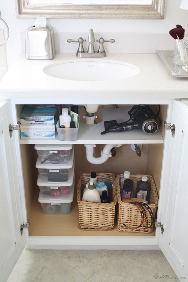 Add a shelf that was cut out for pipes in the cabinet. Use storage space under a bathroom sink for extra toiletries. 