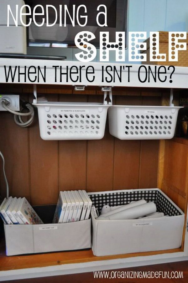 Keep movie DVDs, toys and books organized under the sink for extra storage space. Hang the plastic storage baskets from the pipe or just use some cardboard boxes for storage. 