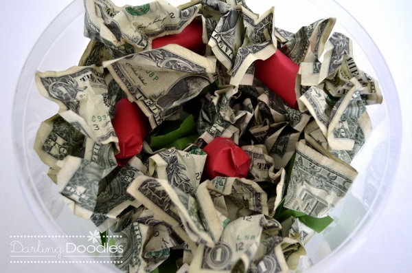 A Bowl Full of Greens. It's such a funny and creative way to give a little cash to the graduate with this bowl full of greens. Fill the bowl with bills as you like, make some tomatoes by rolling quarters in red construction paper and flattening the ends closed. The graduate must enjoy this special gift.