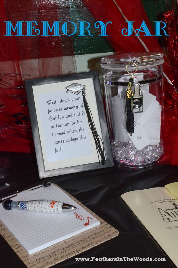 An acrylic jar with a cute notepad to write a memory to place inside for the graduation. Every decor detail matches so perfectly to get this graduation party dolled up.