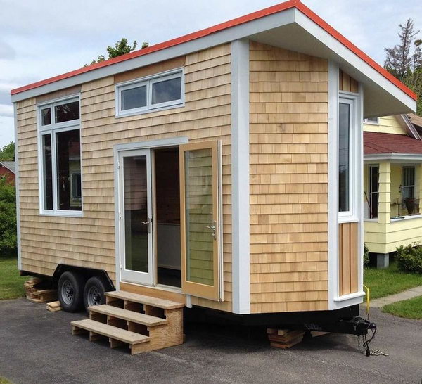 Tiny house on wheel. The tiny house is very attractive both inside and out. It can take you to the place wherever you wanna go.