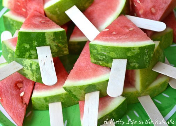 Watermelon Popsicle. If you happen to throw your party on a hot summer day, it's perfect to serve your guests with these Popsicle watermelons. Cut your watermelons to make an incision and insert your stick