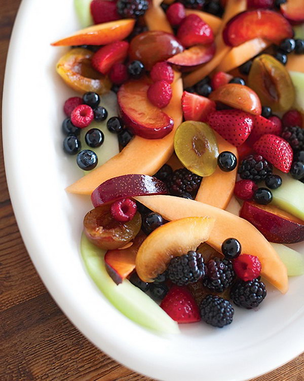 Fresh Fruit Salad. Treat your guests with this boozy fresh fruit salad. Mix strawberries, blueberries, cherries for a cool sweetness to cool down the summer hot air to leave a deep impression on guests for this summer party.