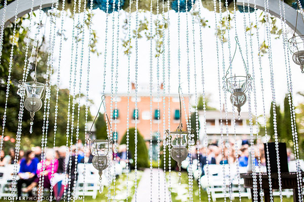 Beaded Curtain. This stunning beaded curtain will bring you to the fairyland. It's super chic to hang up such a beaded curtain for your wedding ceremony where you'll say I do.