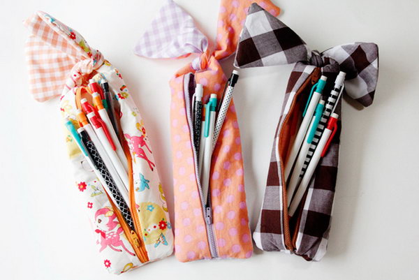 Adorable Bow Pencil Pouch. Sew the lining and main pieces together, insert the zipper and make the bows on the bottom. You'll complete this adorable bow pencil pouch in this beautiful design to pack your pencils.