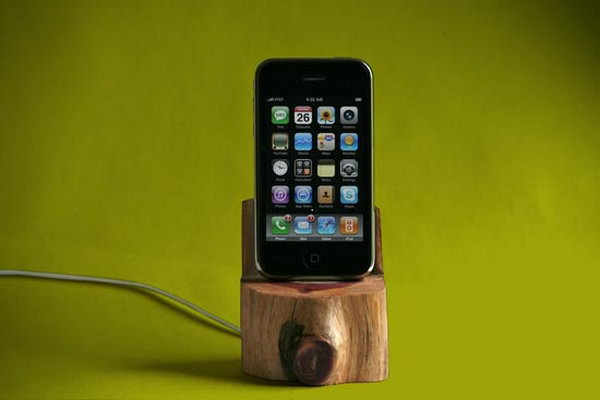 Tree Trunk iPhone Dock. As its name suggests, this iPhone dock features a stand made out of the trunk of a small tree. The iPhone display visual effect is just so fantastic.