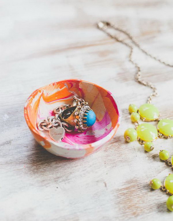 Mini Marbled Decorative Bowls with Nail Polish. Create these stylish mini marbled decorative bowls as a unique gift for any member of your family using different colors of nail polish. 