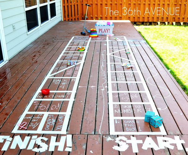 Giant Outdoor Board Game. Make the board with tape and chalk to specify the rules for the activity according to children's suggestions and interests. They will have a lot of fun joining this interesting game on hot summer days.