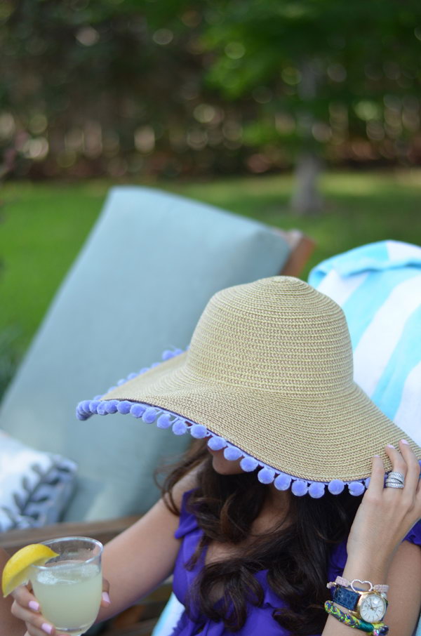 DIY Pom Pom Sun Hat. I love the cute pompoms very much and this is a fun pom pom hat tutorial. 