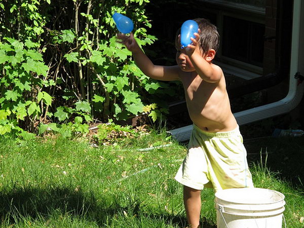 Water Balloon Catch. Fill a bunch of balloons with water to the size of a grapefruit. See how many times you can toss them without breaking. It's also funny to compete with other kids and watch the winner coming through.