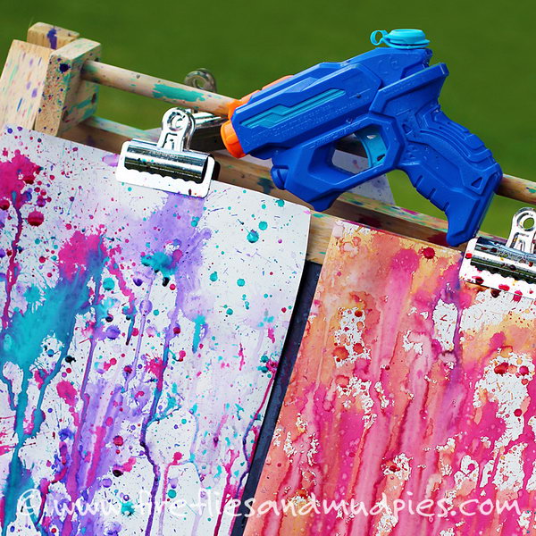  Squirt gun painting. This fun art project is such an awesome summer activity- Hang up a few white sheets on a line. Fill up water guns with different water colors and let the kids make their masterpiece. 