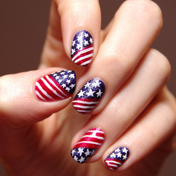 Patriotic Glitter Stars and Stripes Nail Art: Go with the classic patterns, but use glitter polish. Your nail art looks totally something but tacky. See the tutorial here.