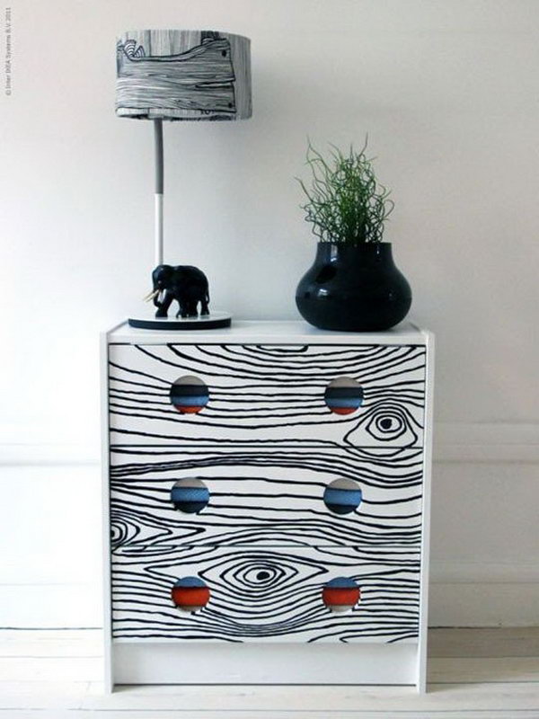 Give your plain IKEA RAST dresser a unique look with a faux bois print. See more instructions