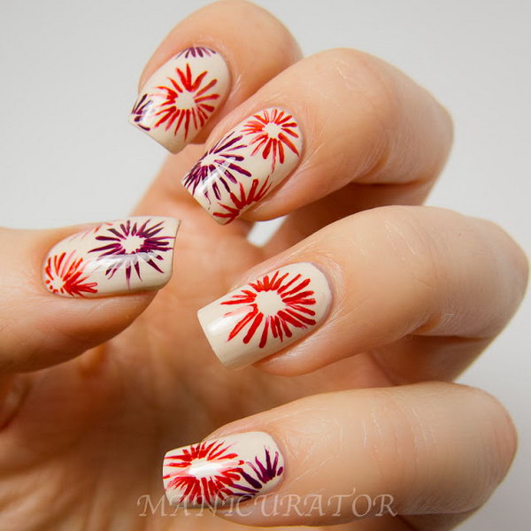 Simple Beauty Patriotic Fireworks Manicure. See the tutorial 