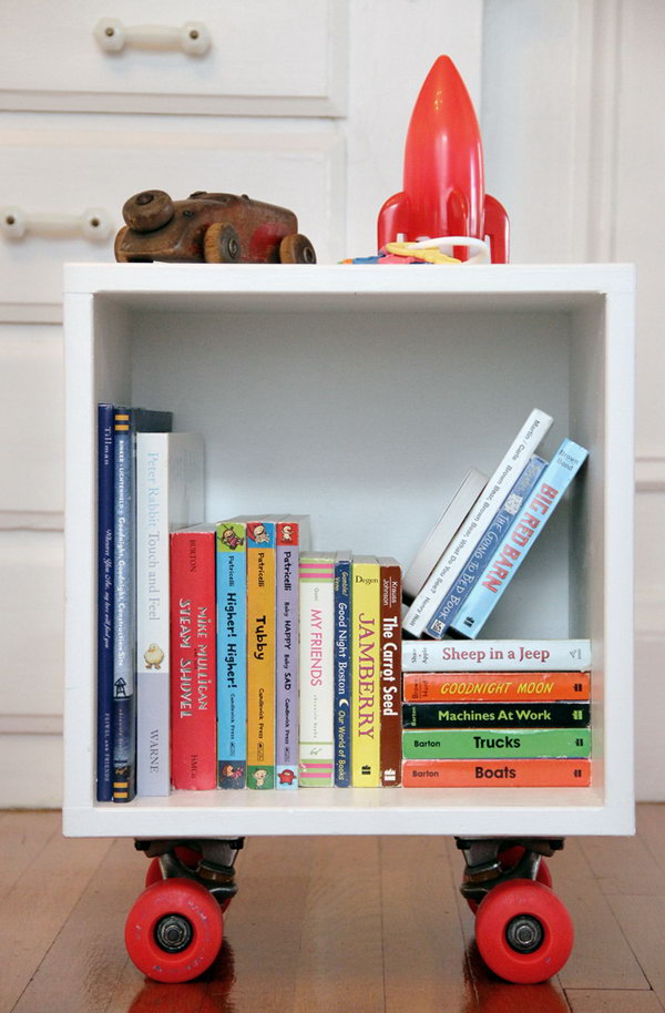 DIY Rolling Skateboard Book Cubby: The mom is a genius who utilized skateboard wheels to make a fun rolling book cubby. I love that this book cubby is not only a spot for the little baby's growing collection of books, but also doubles as a push-cart. 