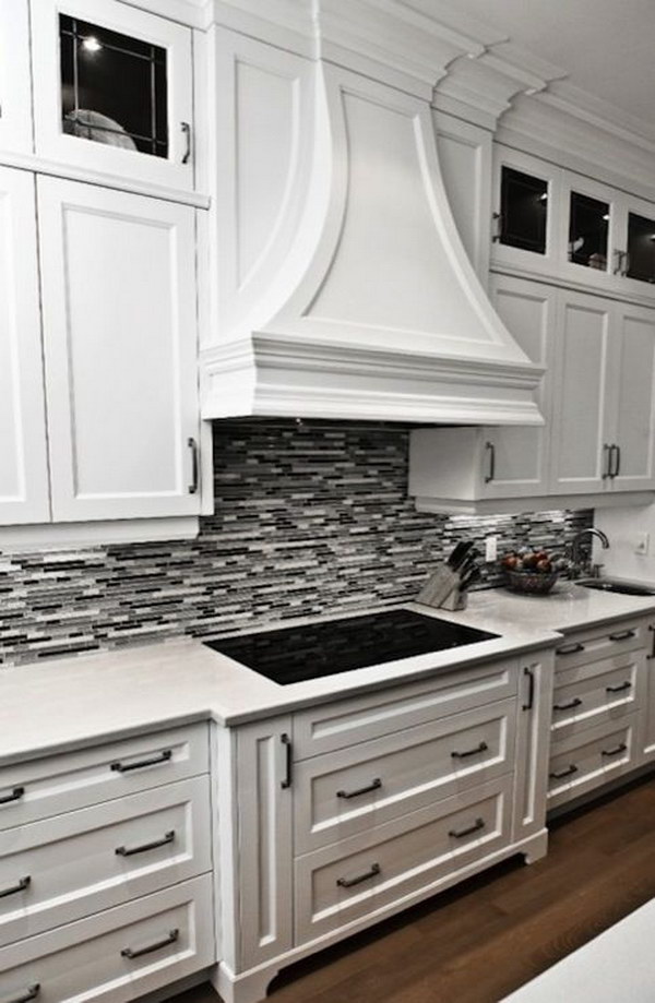 Minimalist White Kitchen Cabinets With Grey Countertops And White Backsplash 