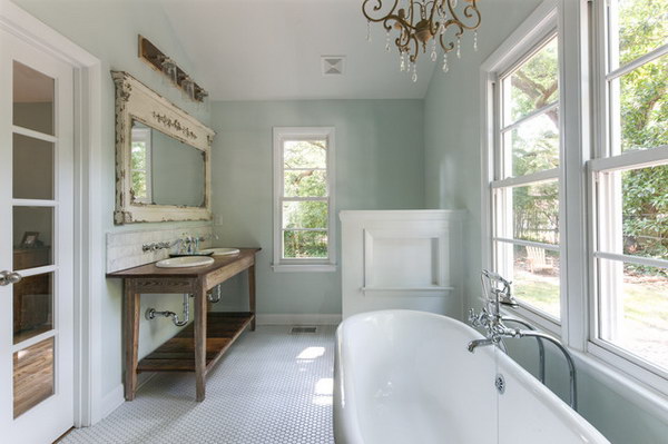 Farmhouse Bathroom With Chandelier Over Tub. 