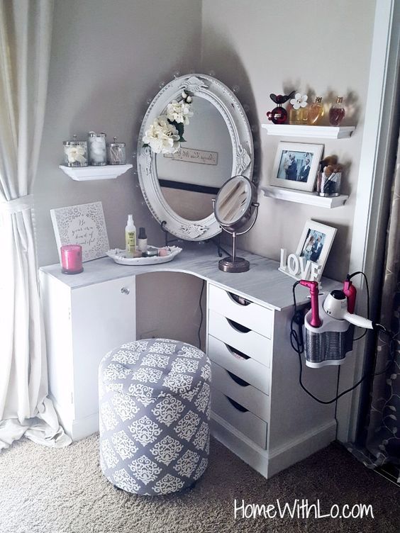 Build a makeup vanity to fit in the corner of your bedroom. 